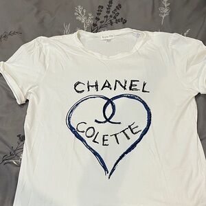 White Tee with sparkling Blue Heart Design